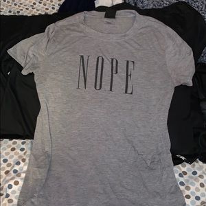“NOPE”, gray shirt